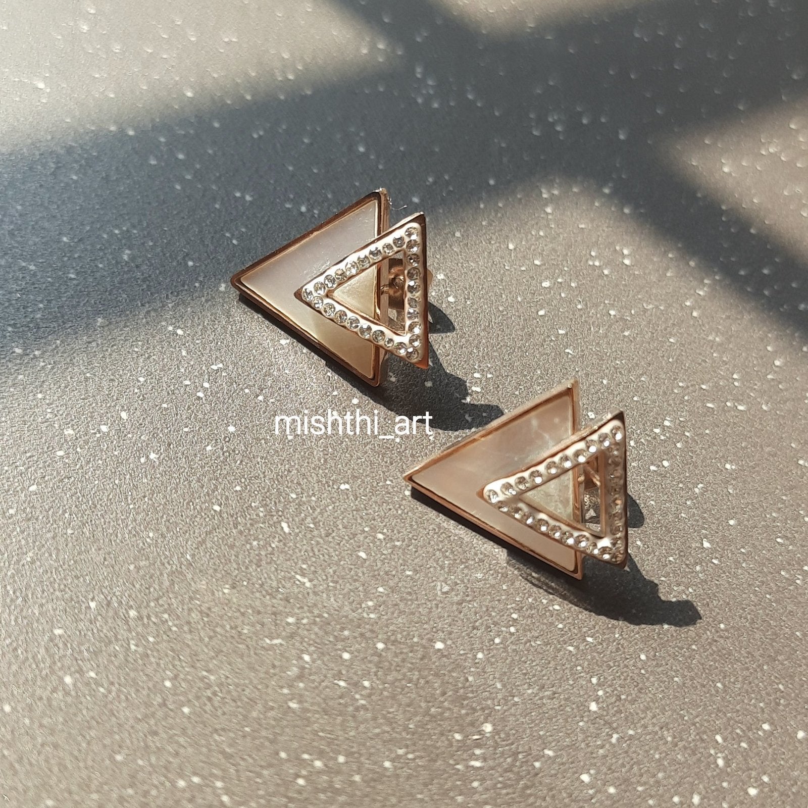 Triangle studs