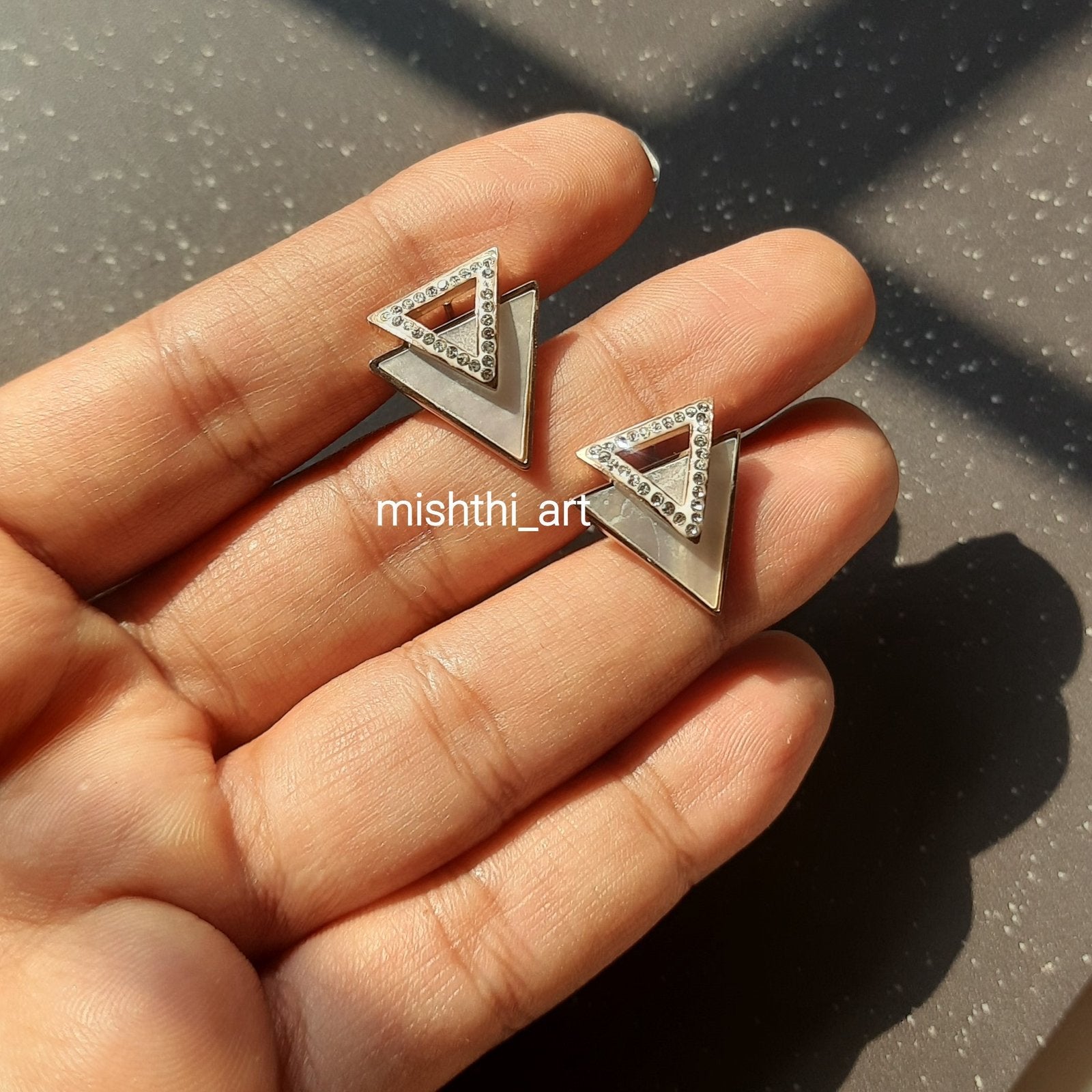 Triangle studs