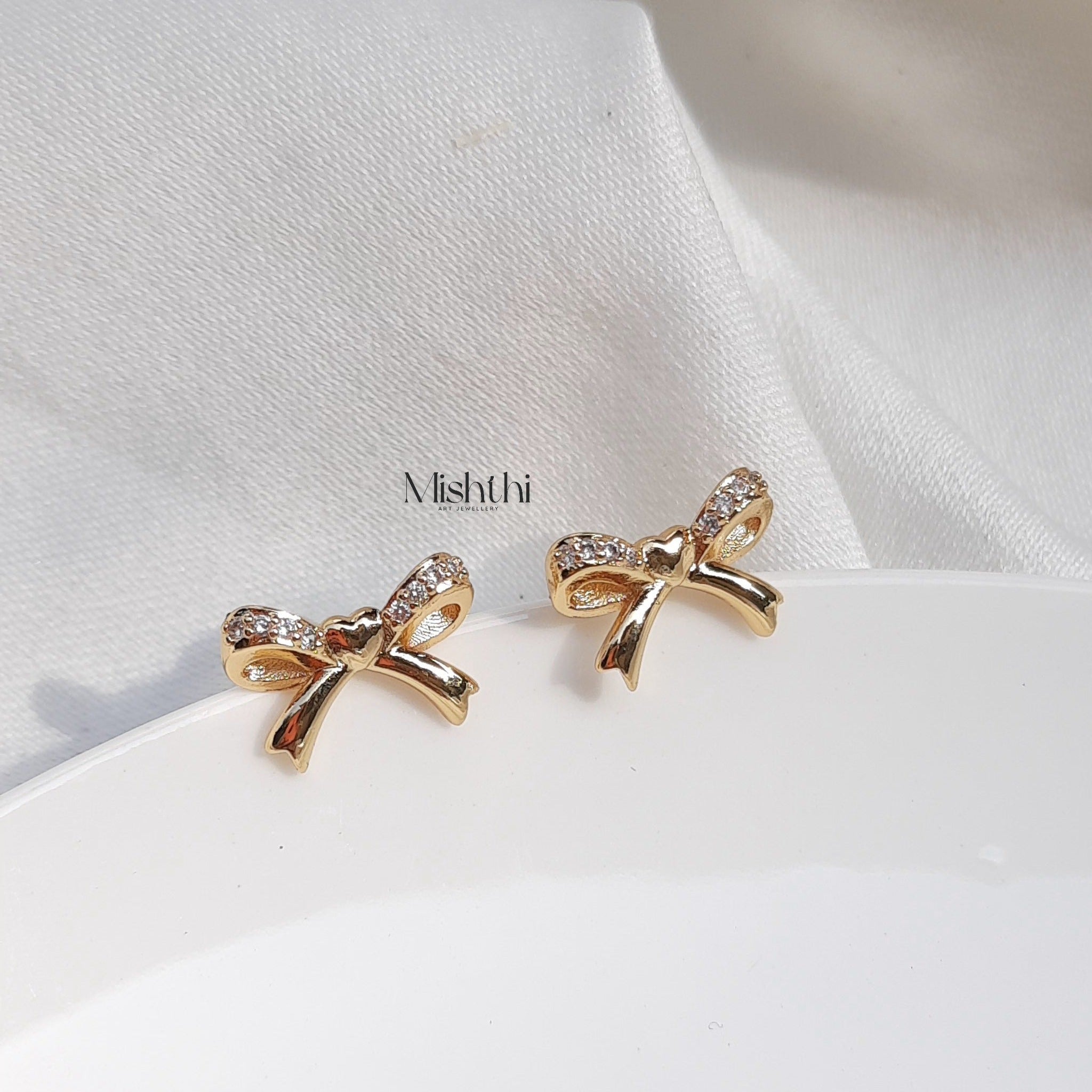 Glow Bow Studs