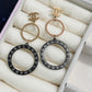 Rosy-Black Round Earrings